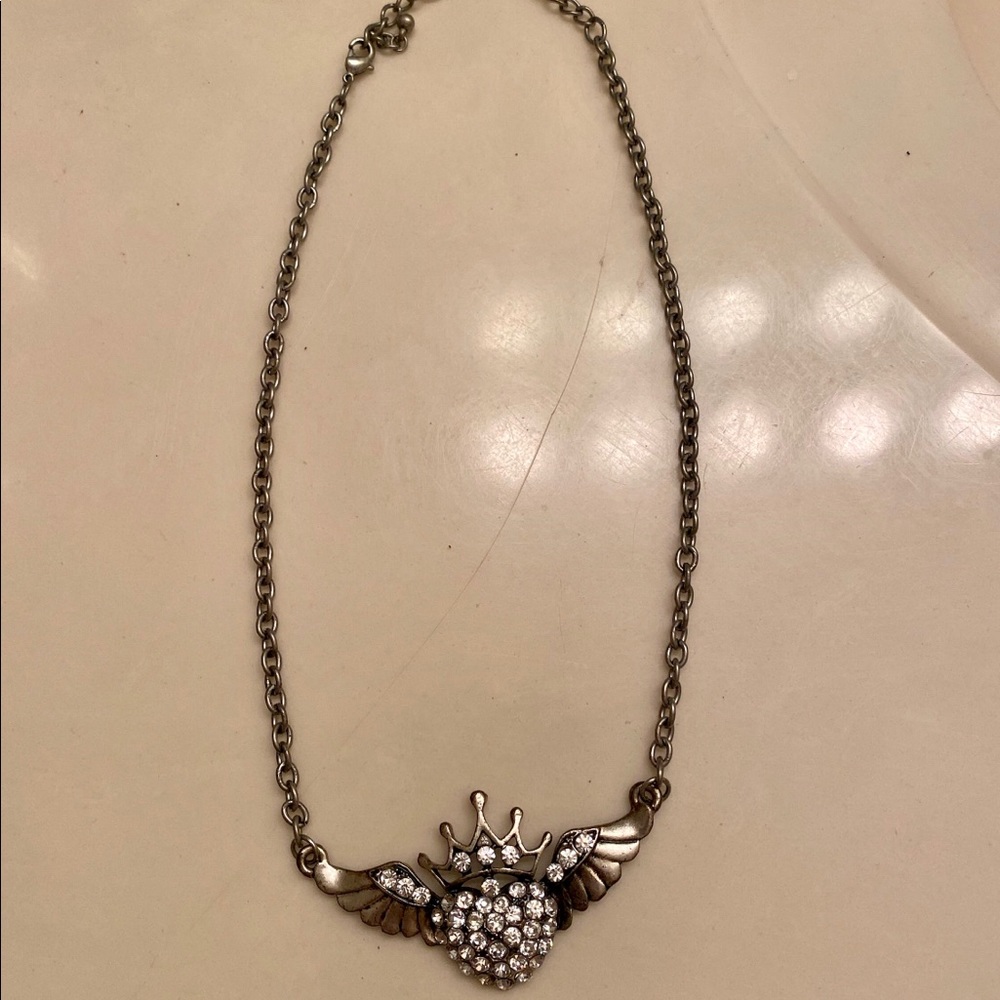 Crown and wing necklace